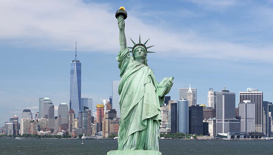 Statue of Liberty. New York, panorama of Manhattan with the One World Trade Center (Freedom Tower) and Hudson River, USA