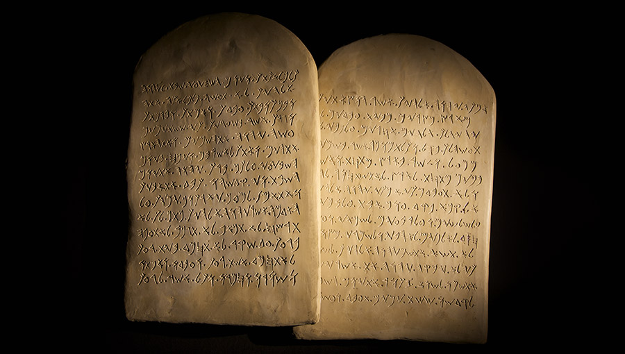 Biblical Ten Commandments inscribed on stone tablets in the Paleo-hebrew script