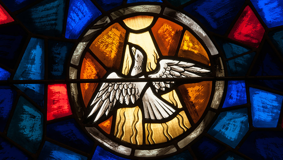 LAWRENCEVILLE, NJ - October 25, 2017: Stained glass window depicting the Holy Spirit in the form of a white dove